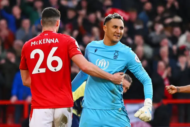 Scott McKenna and Keylor Navas celebrate