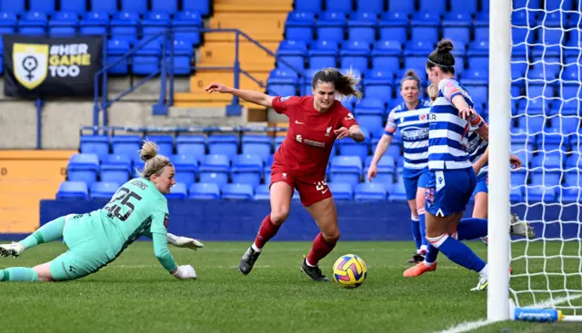 Katie Stengel of Liverpool watches on as the ball is cleared off the line.