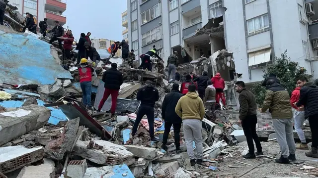 A view of debris as rescue workers conduct search and rescue operations after the 7.4 magnitude earthquake hits Kahramanmaras, Turkey