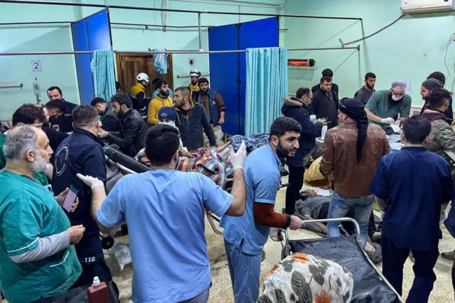 Victims are rushed to the emergency ward of the Bab al-Hawa hospital following an earthquake, in the rebel-held northern countryside of Syria's Idlib province on the border with Turkey, early on February 6, 2023. - At least 50 have been reportedly killed in north Syria after a 7.8-magnitude earthquake that originated in Turkey and was felt across neighbouring countries. (Photo by Aaref WATAD / AFP) (Photo by AAREF WATAD/AFP via Getty Images)