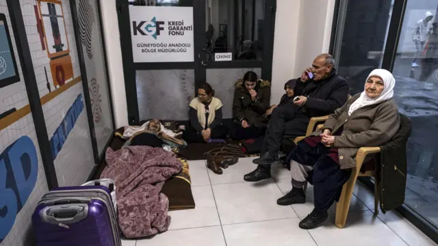 Elderly and young people sit together in the shelter in Diyarbakir