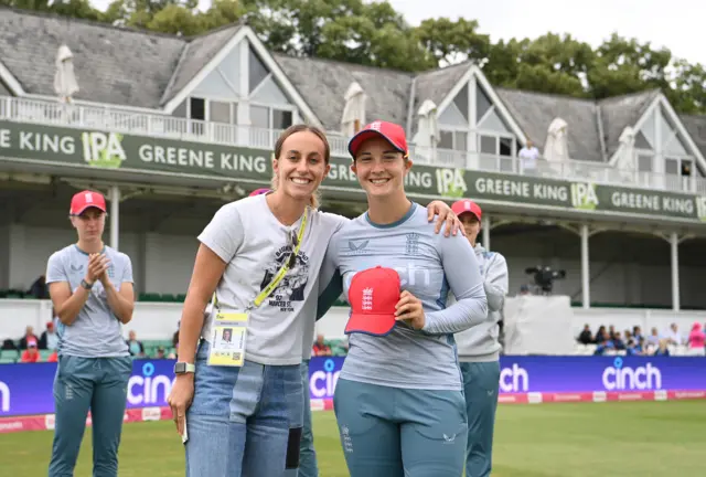 England's Alice Capsey receives her T20 cap from Tash Farrant