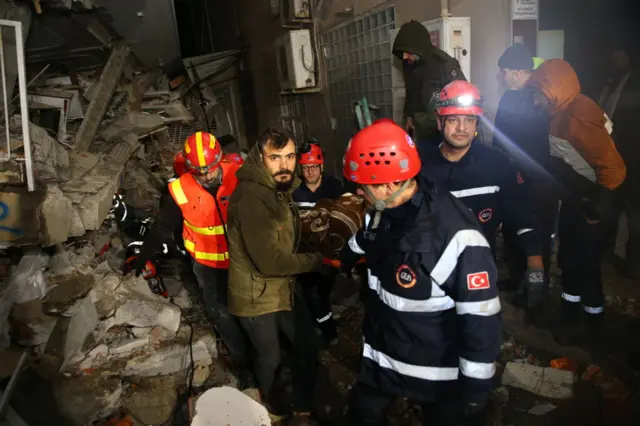 Search and rescue teams work in Hatay