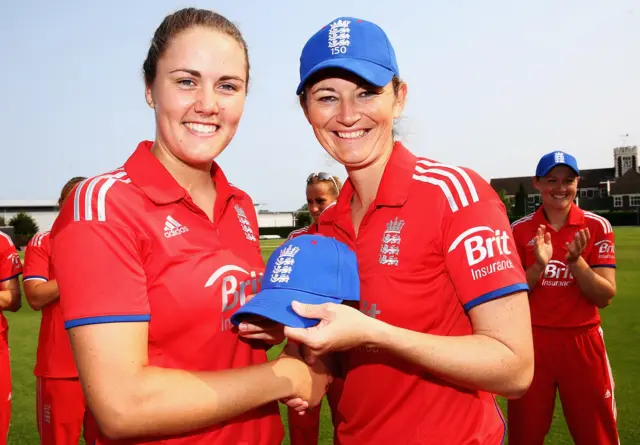 England's Nat Sciver-Brunt receives her cap from Charlotte Edwards ahead of making her debut against Pakistan in 2013