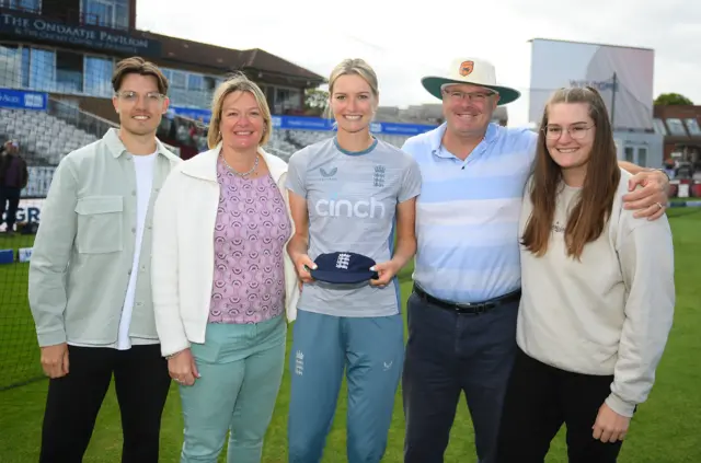 England bowler Lauren Bell alongside her family after being given her Test cap