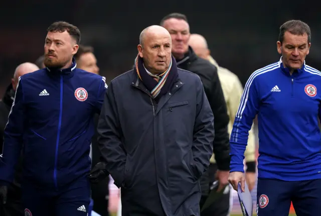 Accrington boss John Coleman (centre)