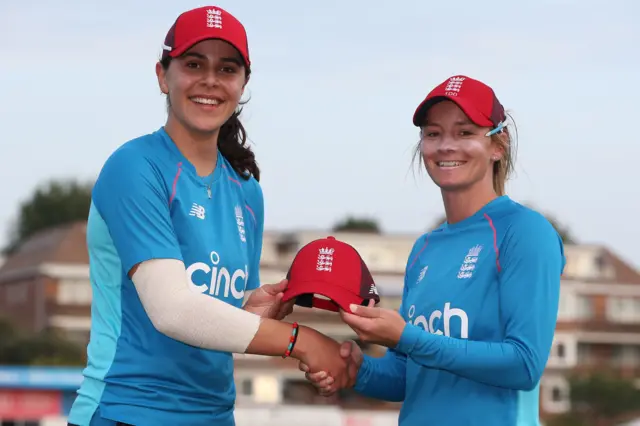 England's Maia Bouchier receives her T20 cap from Danni Wyatt