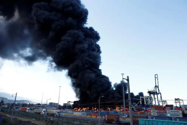 Smoke rising over Iskenderun Port in Turkey