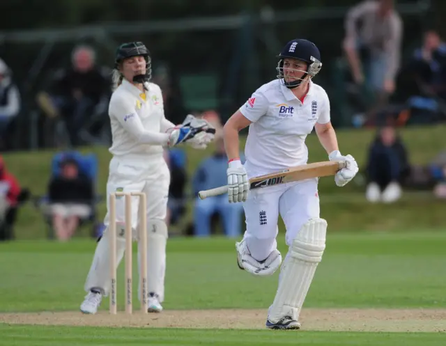 England's Heather Knight runs between the wickets on her way to making a century in the Ashes Test match against Australia at Wormsley in 2013