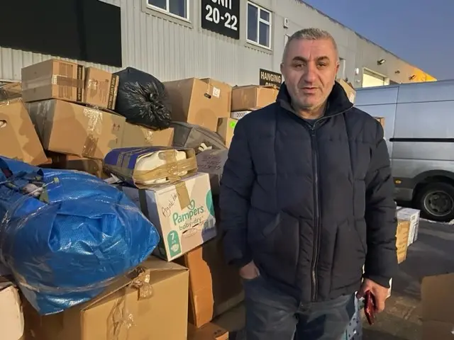 Freight business owner Hussein Sanaci seen at a collection he has organised for the victims of the earthquake in Turkey