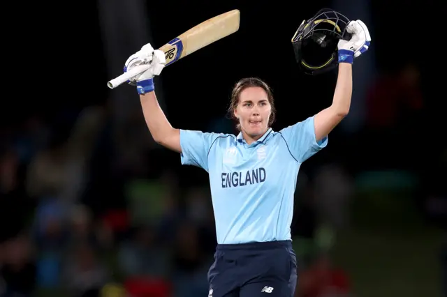 England's Nat Sciver-Brunt celebrates making a century against Australia in the 2022 Women's World Cup final