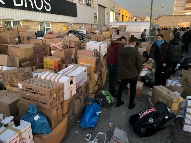 Boxes of donations at a collection for the victims of the earthquake in Turkey