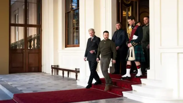 Ukrainian President Volodymyr Zelensky leaving Buckingham Palace