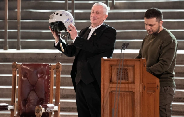 President Zelensky presented Commons Speaker Sir Lindsay Hoyle with the helmet of a real Ukrainian pilot during his speech