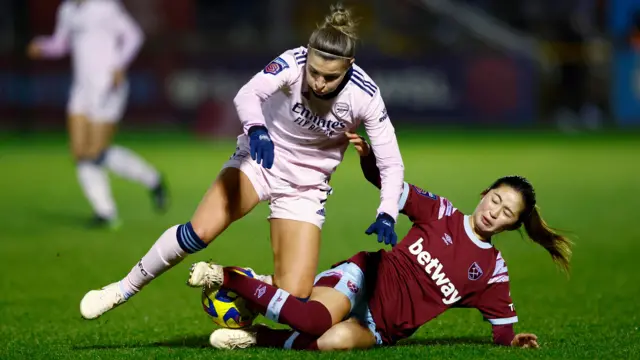 West Ham United's Risa Shimizu in action with Arsenal's Steph Catley