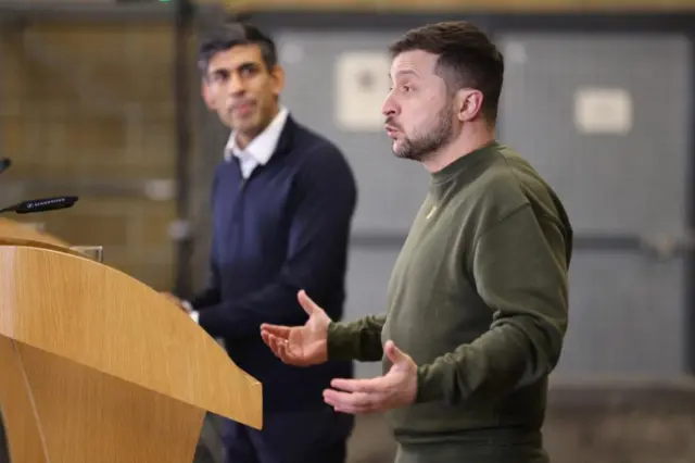 British Prime Minister Rishi Sunak listens to Ukraine's President Volodymyr Zelenskiy