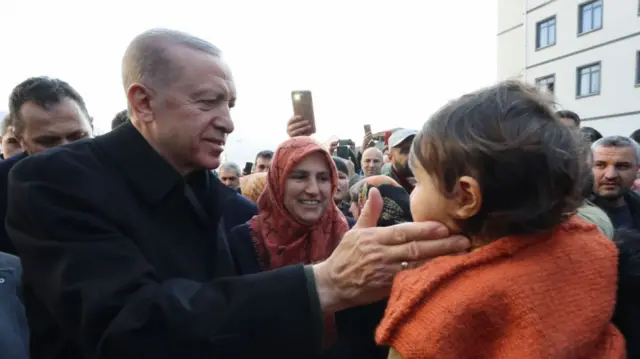 Turkish President Recep Tayyip Erdogan speaks with quake victims after 7.7 and 7.6 magnitude earthquakes hit multiple provinces of Turkiye including Osmaniye, on February 09, 2023