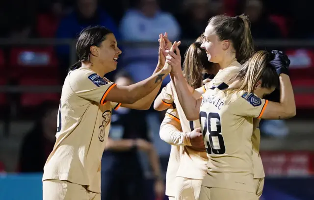 Sam Kerr celebrates scoring for Chelsea at West Ham in Conti Cup semi-final