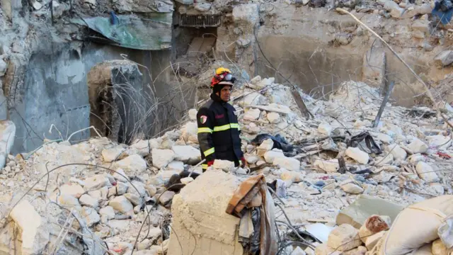 Rescue worker in rubble