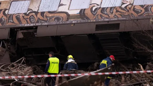 Rescuers at the scene of a deadly train crash in Greece