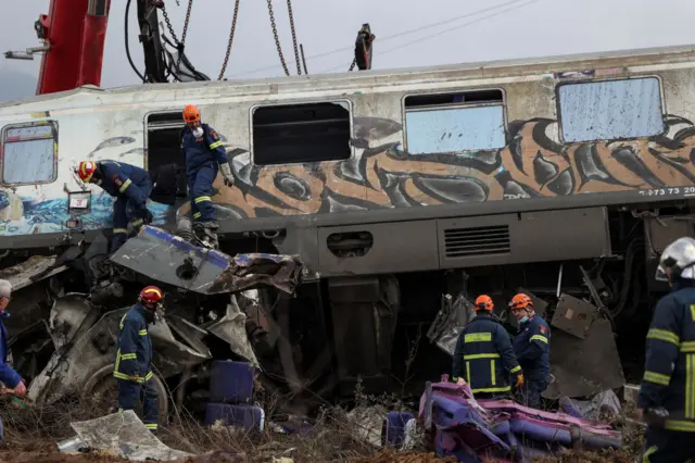 Rescuers operate at the site of a crash.