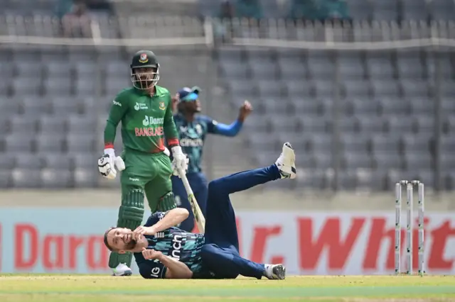 Chris Woakes reacts after dropping Tamim Iqbal in his follow through