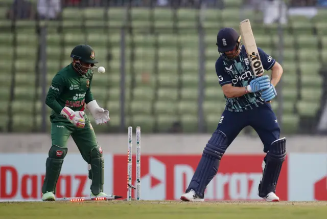 England's Phil Salt is bowled out by Taijul Islam