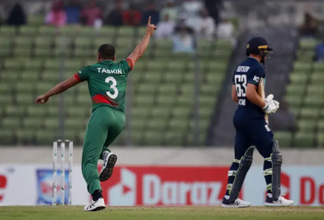 Taskin Ahmed celebrates the wicket of Jos Buttler