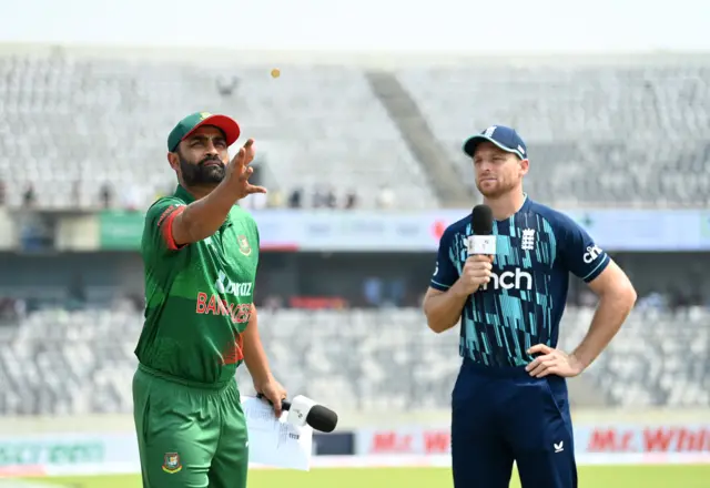 Tamim Iqbal Bangladesh captain tosses coin alongside Jos Buttler England captain prior to the 1st One Day International match between Bangladesh and England at Sher-e-Bangla National Cricket Stadium