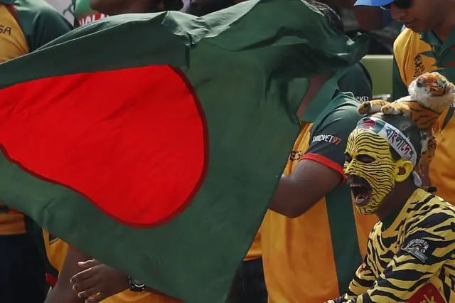 Bangladesh fans cheer for their team