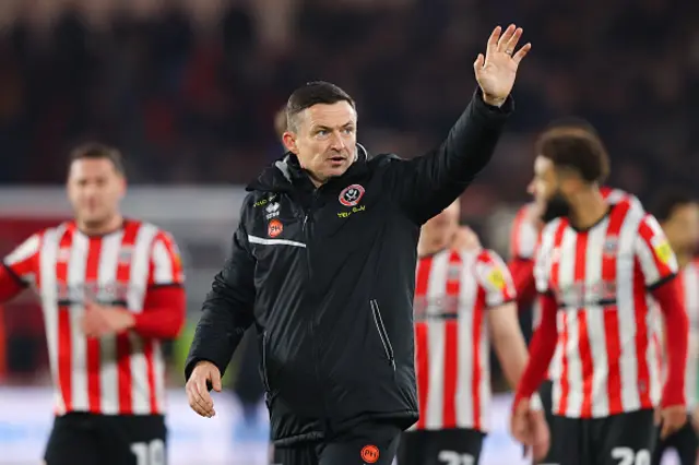 Paul Heckingbottom waving to fans