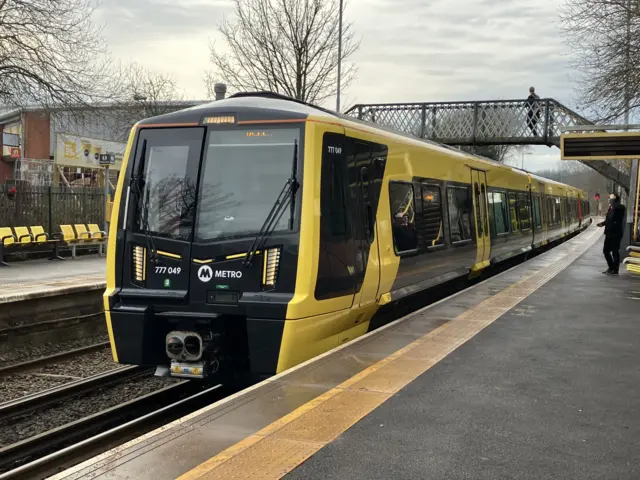 merseyrail train at station