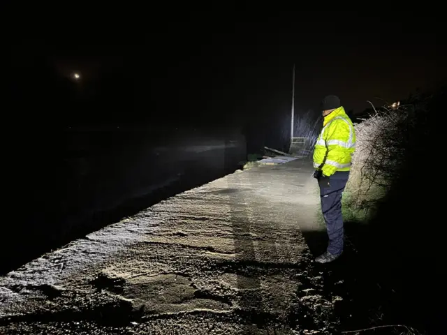 Chris Batten inspecting a telegraph pole