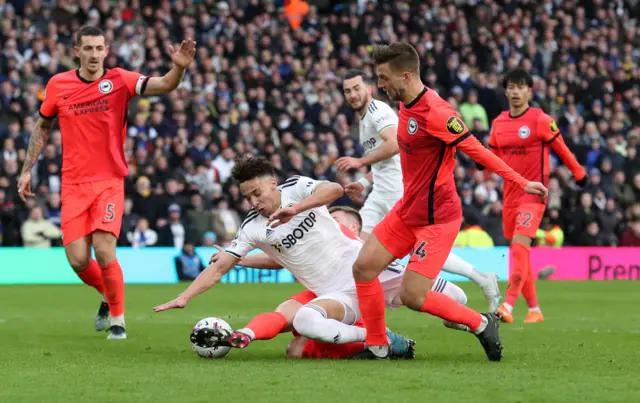 Leeds United's Rodrigo in action with Brighton & Hove Albion's Joel Veltman