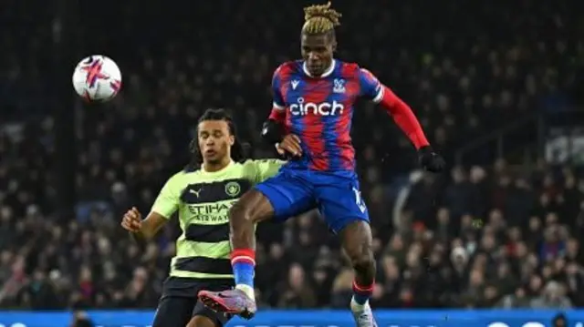 Zaha takes down the ball in the air