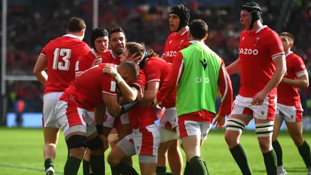 Wales players celebrate Liam Williams' try