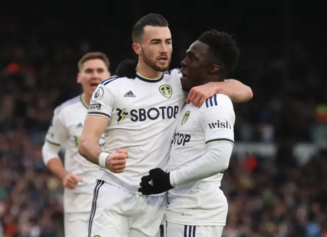 Leeds United's Jack Harrison celebrates scoring their second goal v Brighton with Wilfried Gnonto