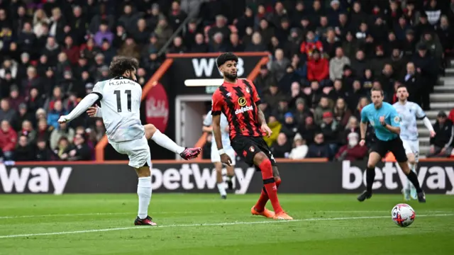 Liverpool's Mohamed Salah takes a shoot in Premier League game v Bournemouth