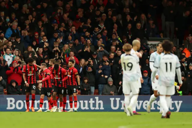 Philip Billing of AFC Bournemouth celebrates with teammates after scoring the team's first goal during the Premier League match between AFC Bournemouth and Liverpool FC at Vitality Stadium on March 11, 2023 in Bournemouth