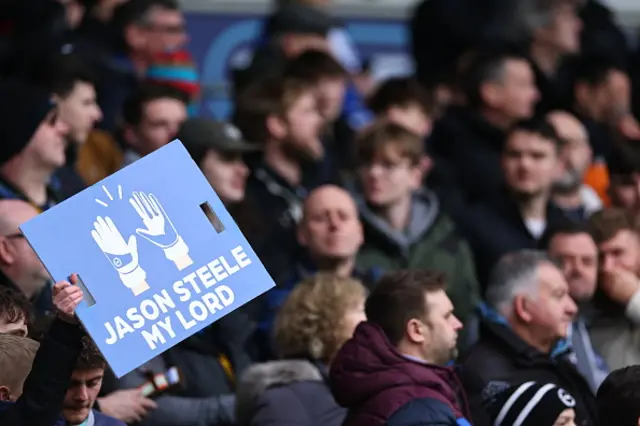 Brighton fan holds up Jason Steele banner