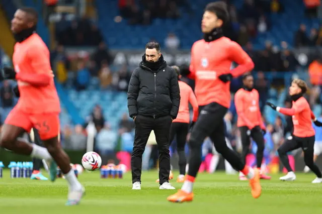 Brighton players warm up before kick-off