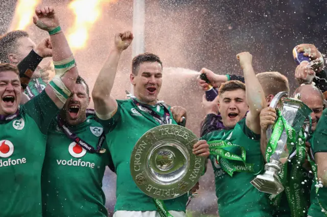 Jonathan Sexton of Ireland celebrates with team mates after their Grand Slam victory during the NatWest Six Nations match between England and Ireland at Twickenham Stadium