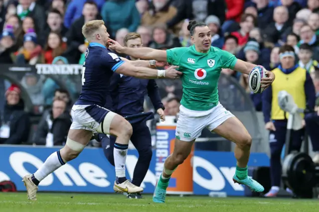 James Lowe of Ireland hands off Kyle Steyn of Scotland during the Six Nations Rugby match between Scotland and Ireland at Murrayfield Stadium