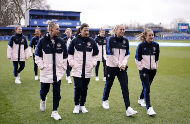 Manchester United on the Kingsmeadow pitch