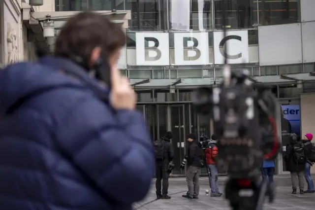 Press assemble outside BBC Broadcasting House