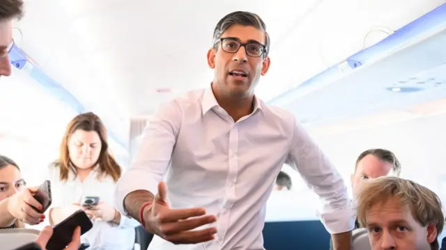 Prime Minister Rishi Sunak speaks to members of the travelling media during his flight to San Diego, US for meetings with US President Joe Biden and Prime Minister of Australia Anthony Albanes