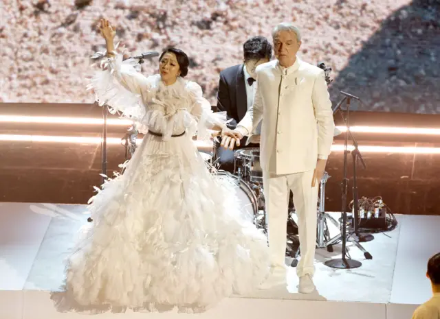 Stephanie Hsu and David Byrne perform onstage during the 95th Annual Academy Awards at Dolby Theatre