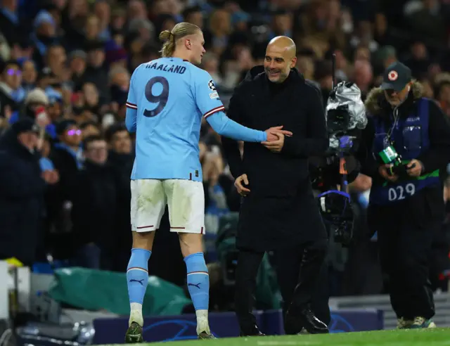 Erling Haaland with Pep Guardiola after being substituted