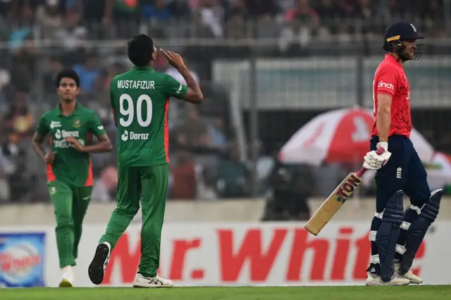 Mustafizur celebrates Malan wicket