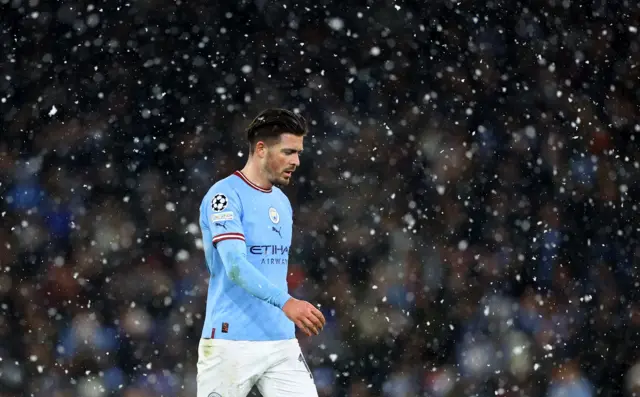 Manchester City's Jack Grealish in the snow